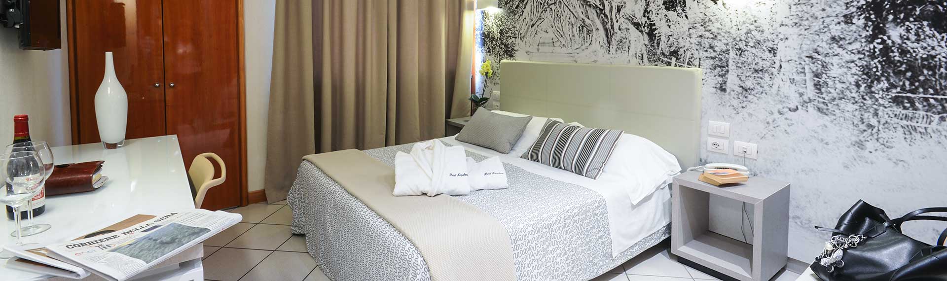 Chambres Standard et Confort pour voyages d'affaires, couples et familles en vacances à Lucques